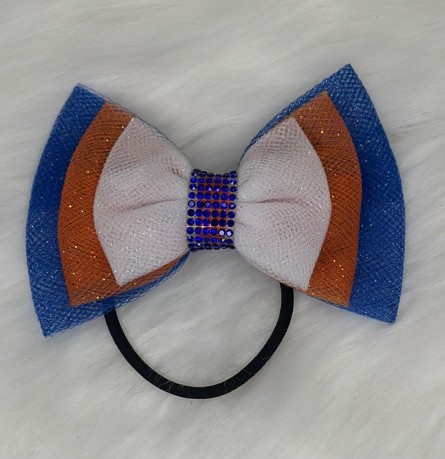 Mckenleigh’s Pride of Orange/Blue Triple